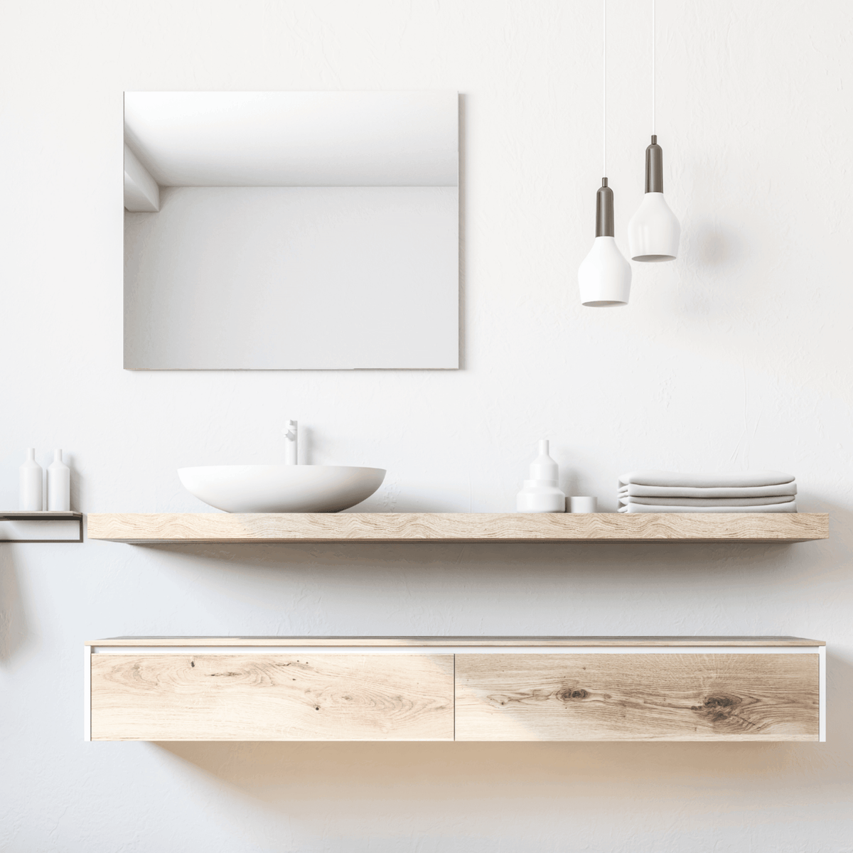 Rahmenloser Wandspiegel über einem Waschbecken